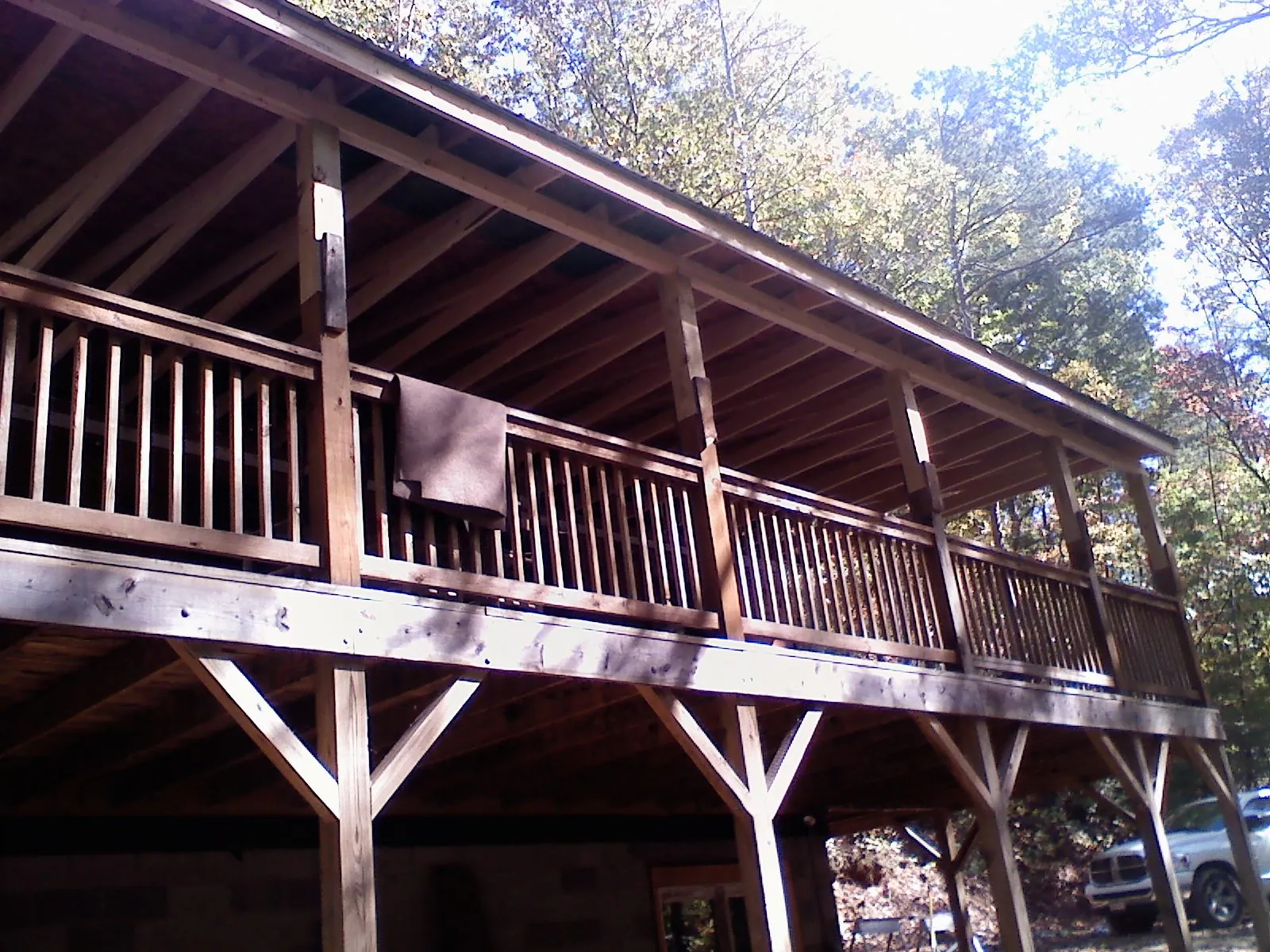 Timber framing under a new elevated porch and deck — Roof Leak Repair in Allyn by Roofing Brothers
